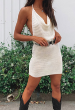 Load image into Gallery viewer, A knitted crochet dress that is perfect for a festival look, or beach cover-up! It&#39;s off-white and features a cowel neck.  Not lined 60% Cotton, 40% Polyester