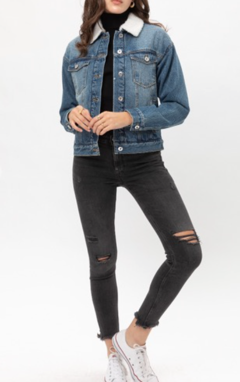 A classic denim jacket! Gold tip: pair it with red lipstick for a playful twist.   70% Rayon, 25% Nylon, 5% Spandex