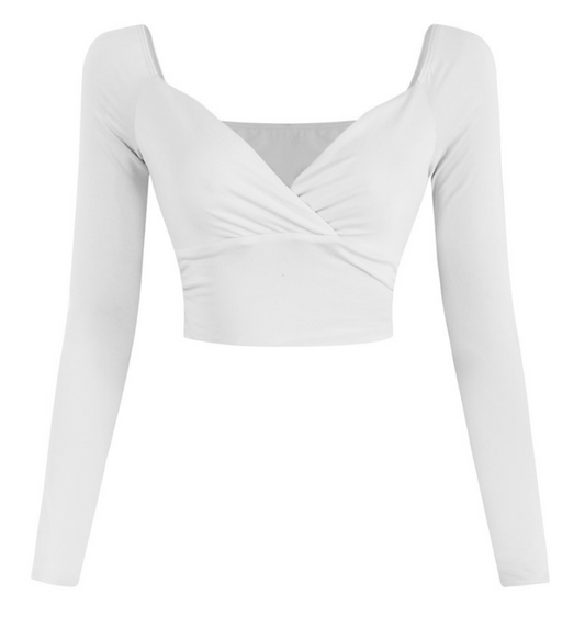 This stunning crop top is a need. It features a V neck and tunnel sleeve. Gold tip: pair it with our Flirty Flare Pants.  Made in the US 96% Polyester 4% Spandex