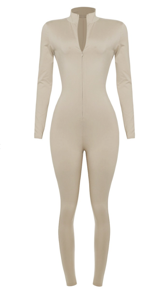 A must-have! It features a mock neck, zipper, and figure-hugging brushed material. It can be layered or worn alone for a comfy fit. It'll keep you warm, but the material is breathable. It is also super soft!  Made in the US 82% Polyester / 18% Spandex