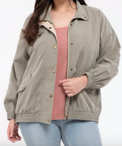 This light weight  jacket features a zipper, button closures, front pockets, elasticized bottom waist, and arm cuffs. <3