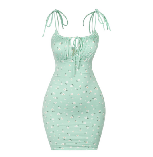 A sage green floral dress that's made for Spring. It features a drawstring and self ties. It's single-layered and is lined.  Soft and stretchy Made in the US 96% Polyester / 4% Spandex