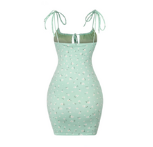 Load image into Gallery viewer, A sage green floral dress that&#39;s made for Spring. It features a drawstring and self ties. It&#39;s single-layered and is lined.  Soft and stretchy Made in the US 96% Polyester / 4% Spandex