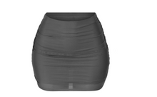 Load image into Gallery viewer, This mini skirt has a mesh overlay. It features: Lined Stretchy  Mesh overlay Made in the US Ruched detailing