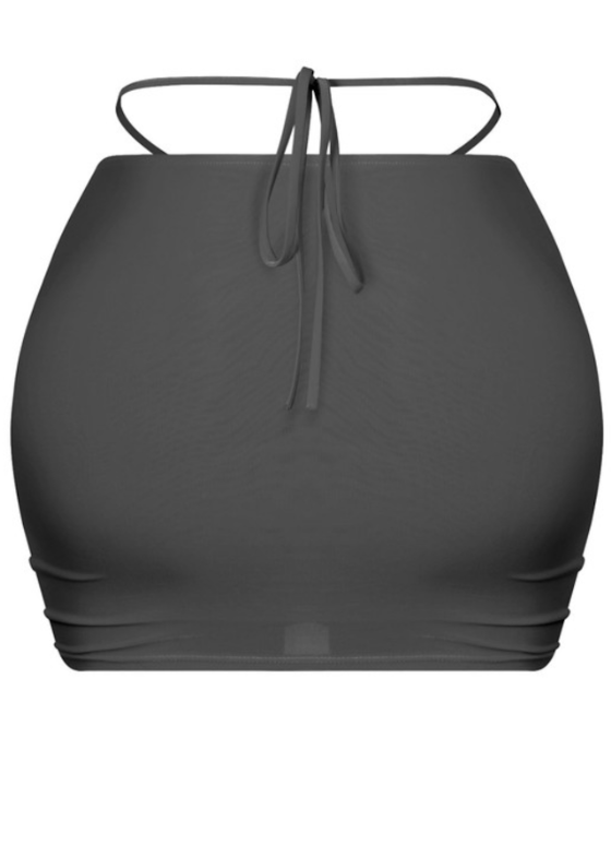 This mini skirt is perfect for spicing up your looks. It features: Stretchy  Low waist  Waist self-tie Made in the US Double-layered Ruched detailing