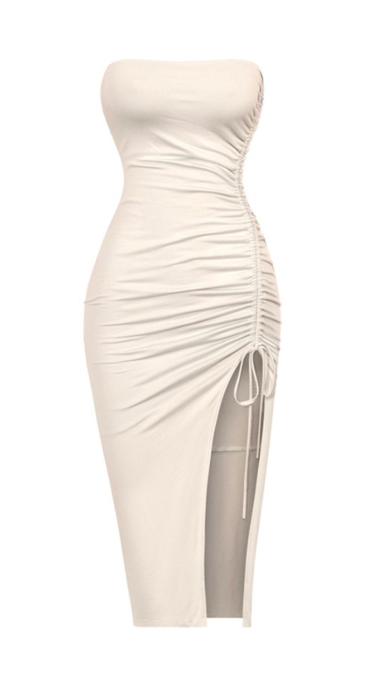 This dress gives us major beachy vibes! The perfect color for Summer.  Midi fit Side slit Stretchy Made in the US Double-layered Side drawstring tie