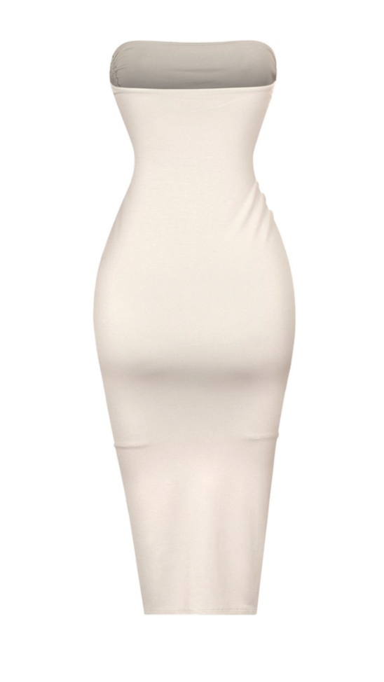 This dress gives us major beachy vibes! The perfect color for Summer.  Midi fit Side slit Stretchy Made in the US Double-layered Side drawstring tie