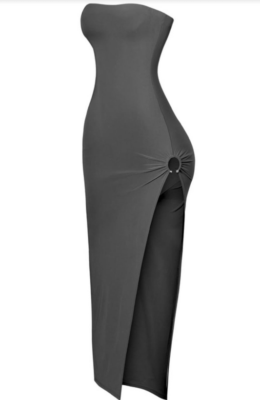 The perfect black vacay maxi dress with a side metal ring.  Maxi fit Side slit Stretchy Side metal ring Made in the US Double-layered