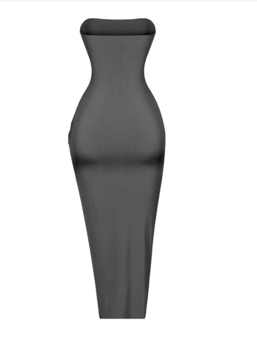 The perfect black vacay maxi dress with a side metal ring.  Maxi fit Side slit Stretchy Side metal ring Made in the US Double-layered