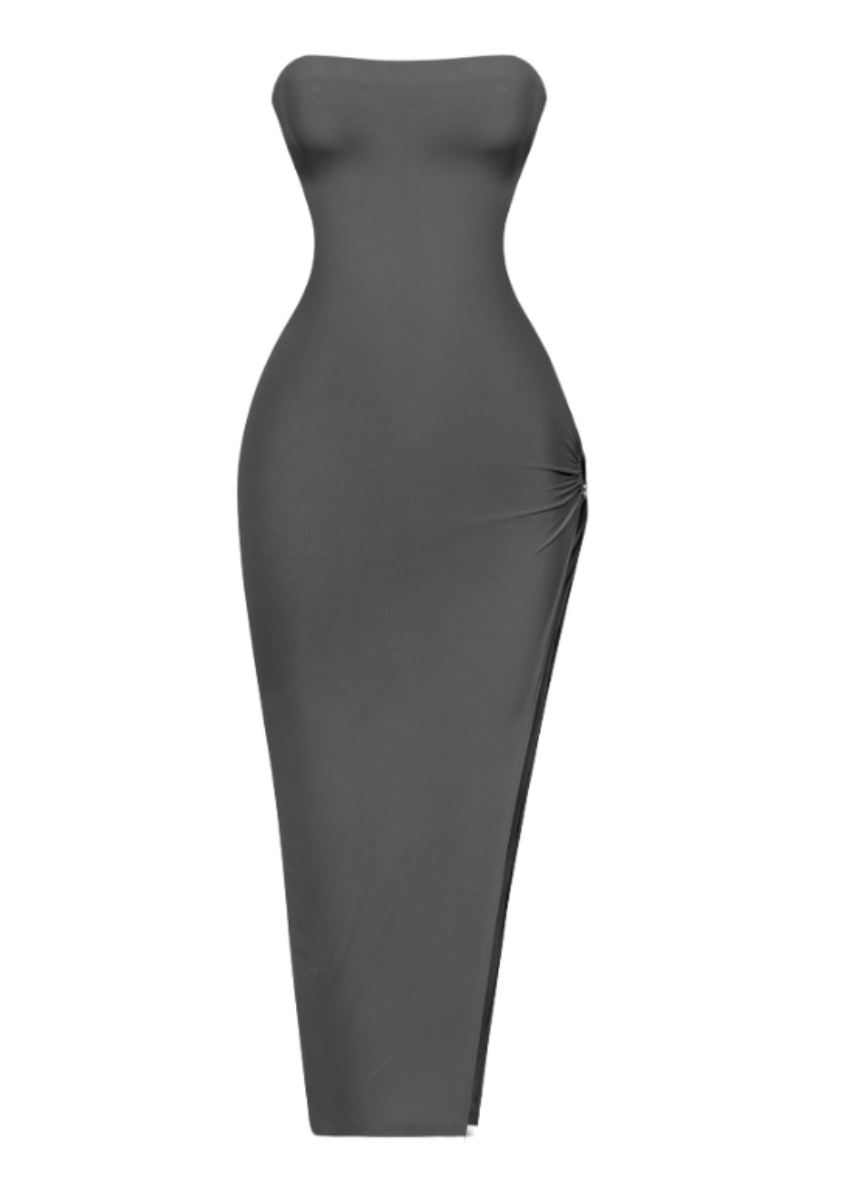 The perfect black vacay maxi dress with a side metal ring.  Maxi fit Side slit Stretchy Side metal ring Made in the US Double-layered