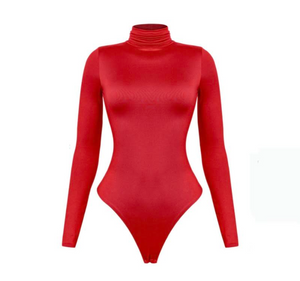 A beautifully made long sleeve turtleneck bodysuit that's made to last. It features a snap button closure. The material is extremely soft and is made to keep you warm/cool. It's also double-layered.